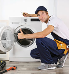 Verified Mas Experts technician repairing a washing machine in Bangalore